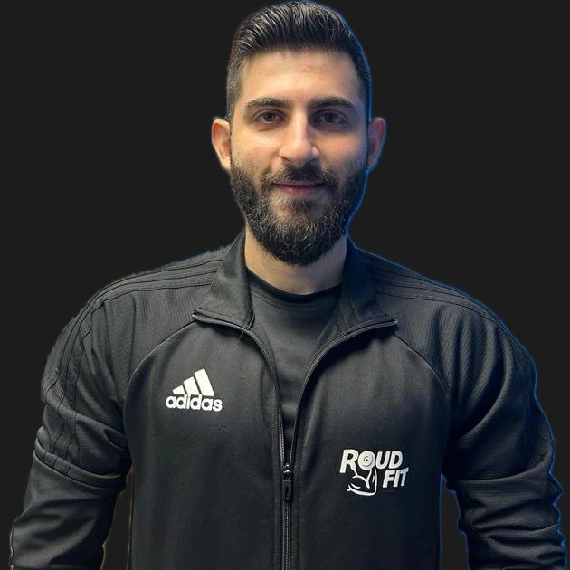 Moudi, personal trainer, in a Roudfit track jacket